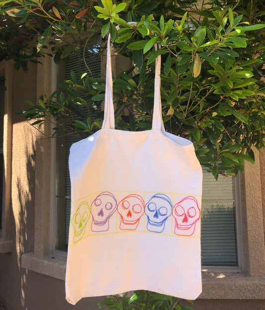 Hand-embroidered skelly tote